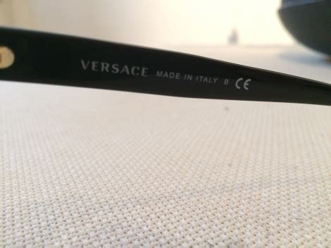 how to check versace serial number|Versace verification code.